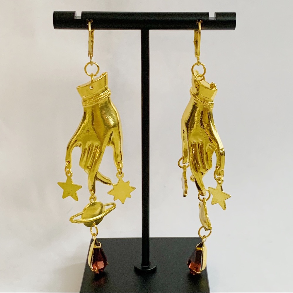 Gold Dangling Hand Planet and Star with Burgundy Cubic Zirconia Earrings